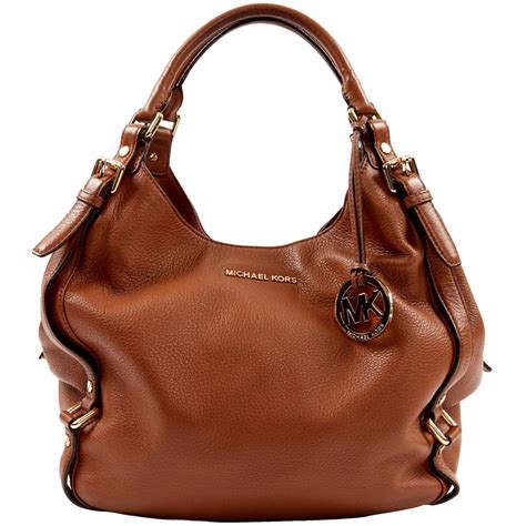 is michael kors bags real leather|michael kors leather purse.